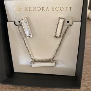 Authentic Kendra Scott earrings with matching necklace.  White pendant bar style
